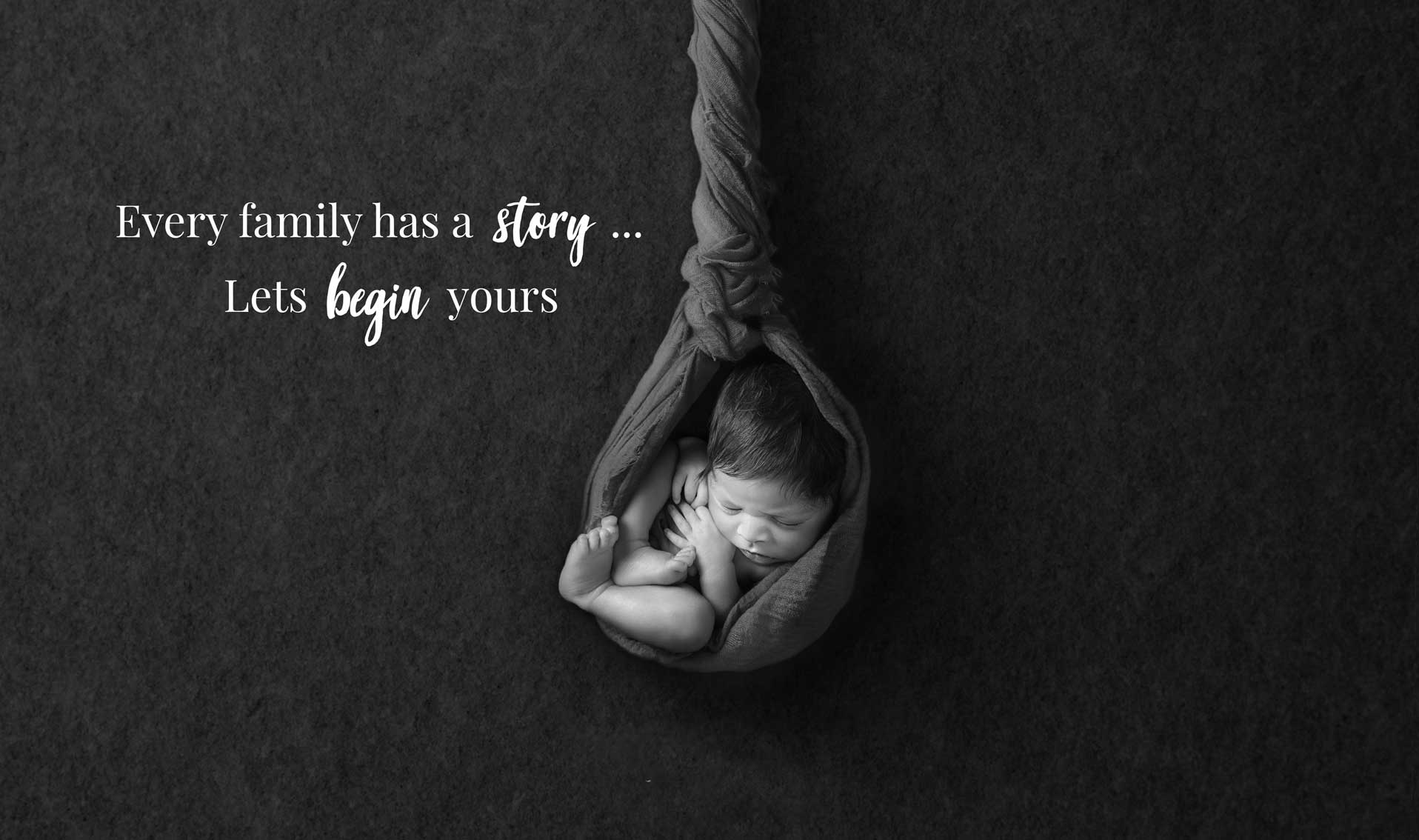 beautiful photo of a hanging baby by newborn photogrpher rayah sunshine